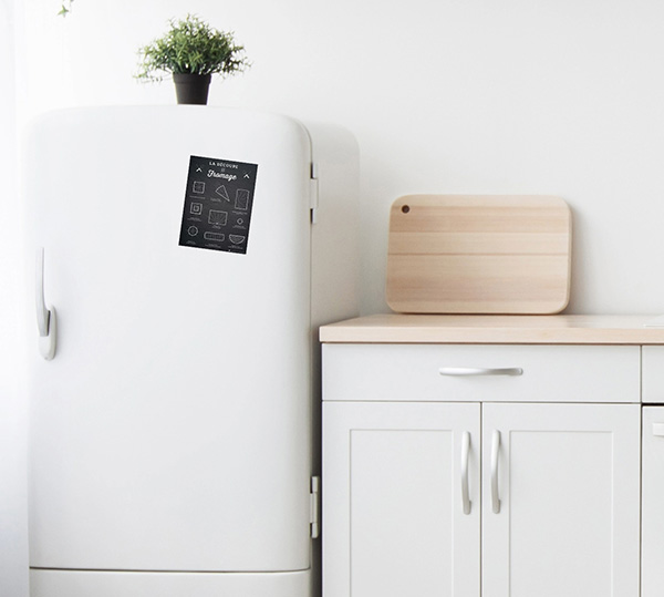 Magnet découpe du fromage sur le frigo